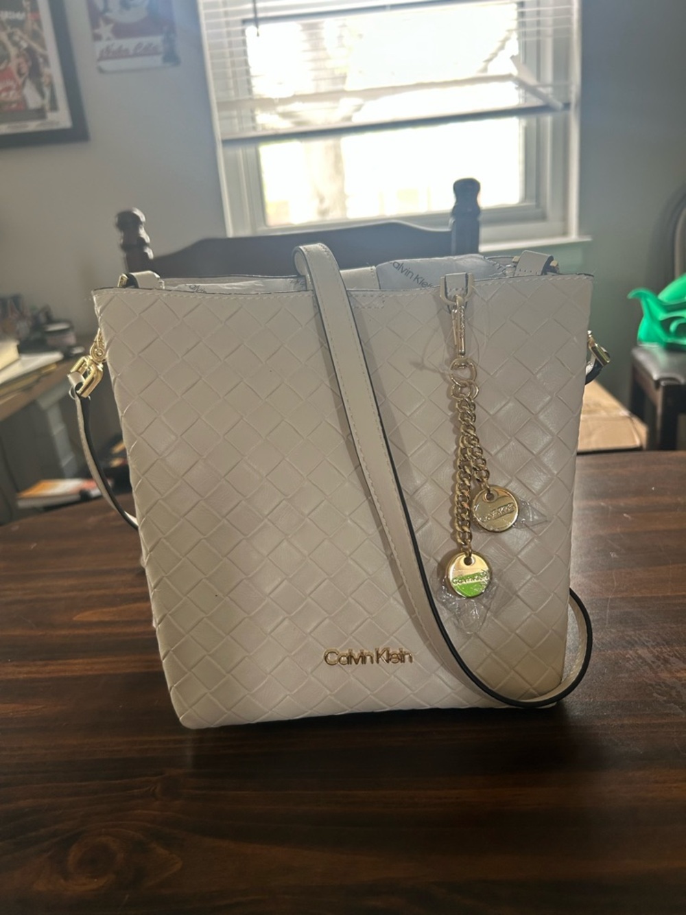 Calvin Klein Off-White Quilted Crossbody Bag with Gold Charms